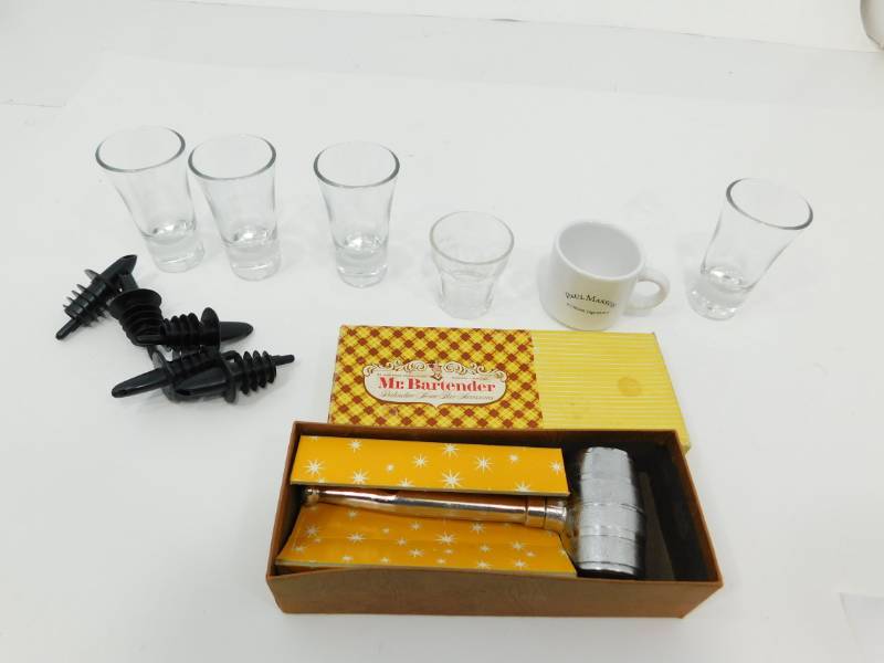 lot 85 image: Mr Bartender Metal Bar Shot Glass & Five Shot Glasses & Paul Masson Ceramic Shot Cup & Five Liquor Bottle Stoppers