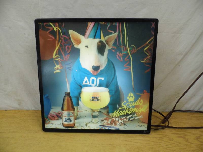 lot 76 image: Spuds MacKenzie Sign