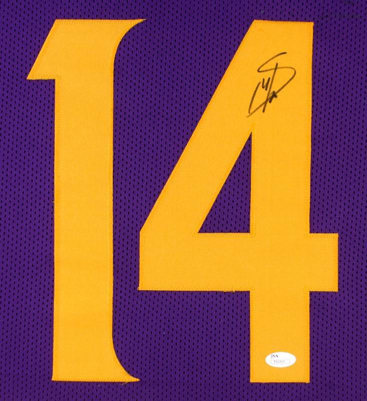 lot 6 image: Stefon Diggs Signed 31 x 35 Custom Framed Special Edition Color Rush Jersey (JSA COA)