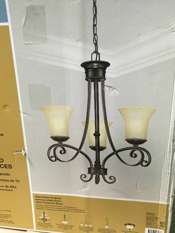 lot 12 image: Hampton Bay Essex 3-Light Aged Black Chandelier with Tea Stained Glass Shades