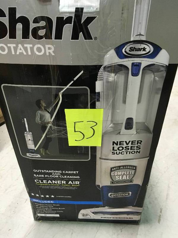 lot 53 image: Shark Rotator Professional Upright Canister Vacuum w XL Extending Reach  NV401 In good condition.