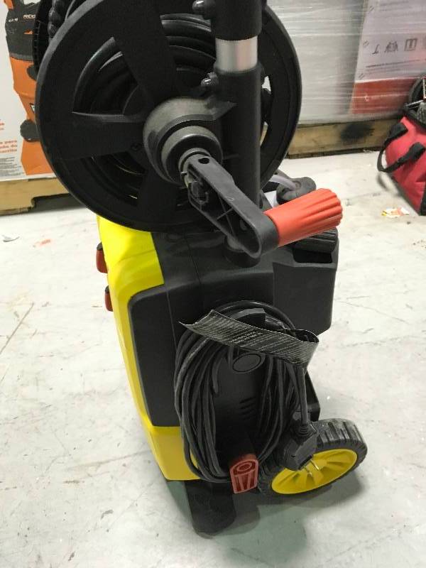 lot 57 image: Stanley 2,000 PSI 1.4 GPM Electric Pressure Washer With 30 ft. Working Hose Reel, Detergent Tank, Spray Gun USED NO WAND  in good working condition