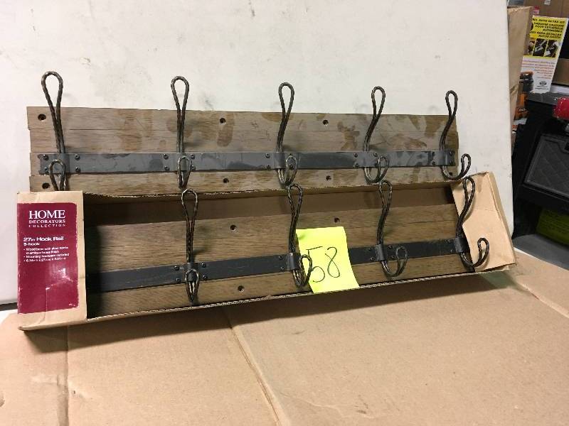 lot 58 image: Home Decorators Collection 27 in. Decorative 5-Hook Key Rail in Antique Brass