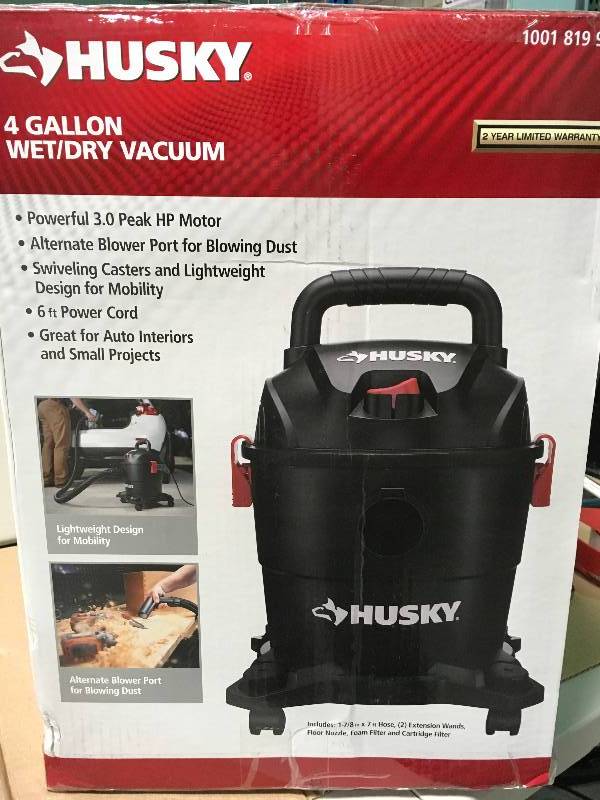 lot 73 image: Husky 4 Gal. Portable Poly WetDry Vacuum not used