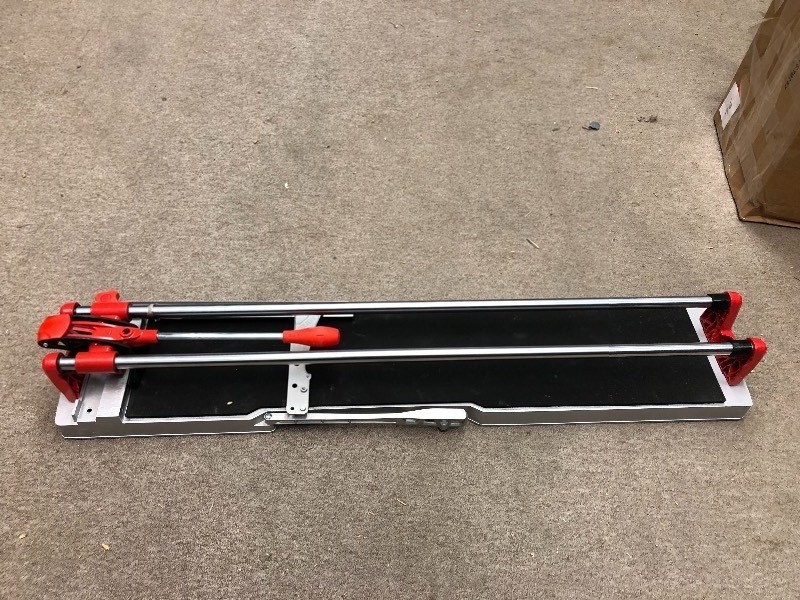 lot 104 image: Rubi 36 in. Speed Plus Tile Cutter in working conditions