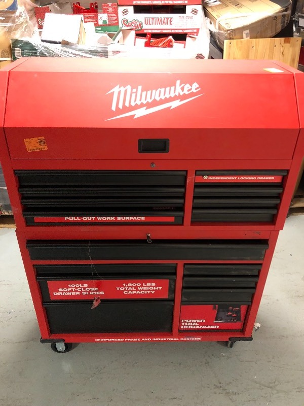 lot 101 image: Milwaukee 46 in. 16-Drawer Tool Chest and Rolling Cabinet Set, Red and Black whit damage please review the pictures