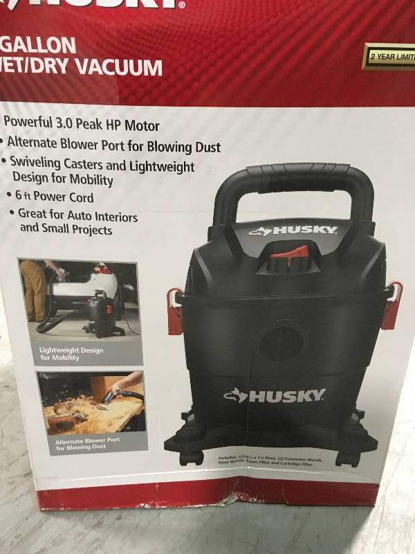 lot 2 image: Husky 4 Gal. Portable Poly WetDry Vacuum not used