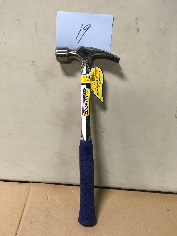 lot 19 image: Estwing 22 oz. Solid Steel Framing Hammer with Curved Claw and Shock Reduction Blue Vinyl Grip not used