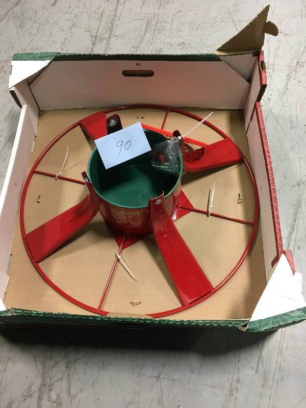 lot 90 image: Santas Solution Ultimate Steel Tree Stand for Live Trees Up to 12 ft. Tall not used