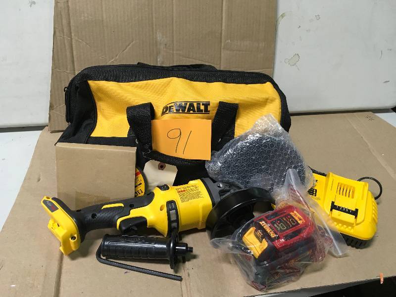 DEWALT FLEXVOLT 60-Volt MAX Lithium-Ion Cordless Brushless 4-12 in. Angle Grinder with Battery 2Ah, Charger and Contractor Bag in like new condition