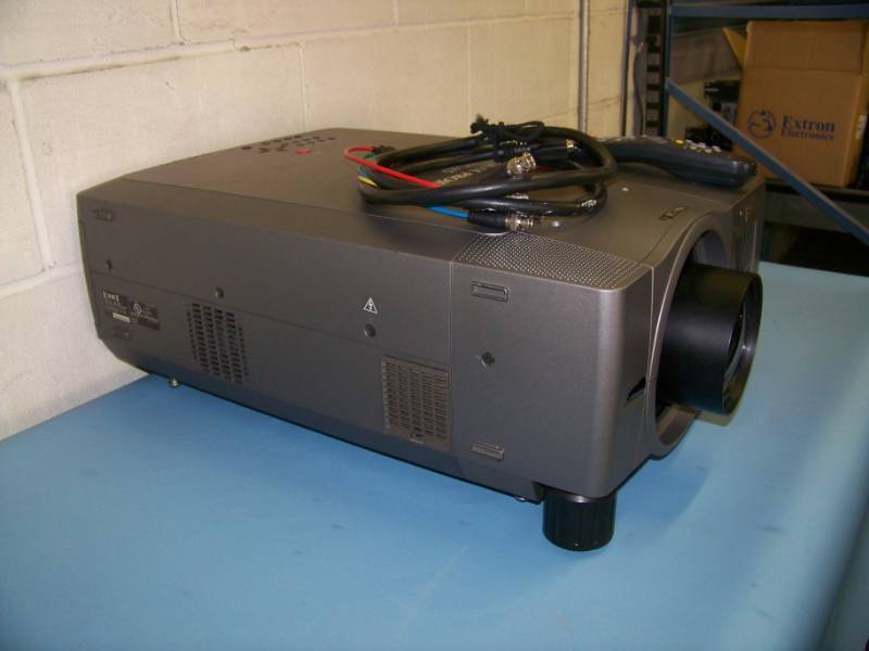lot 67 image: EIKI, LC-X5, LCD Projector with Remote Control in Hard Sided Padded Inside Travel  Shipping Case on Wheels