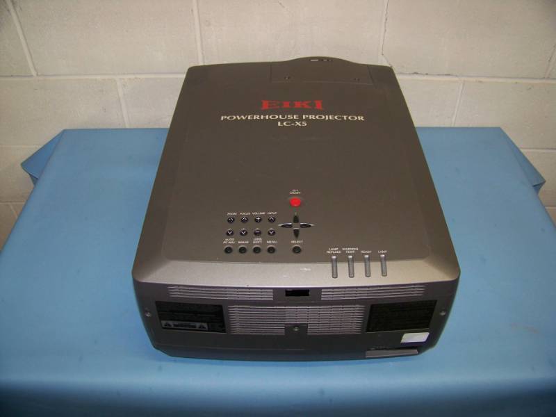 lot 68 image: EIKI, LC-X5, LCD Projector in Hard Sided Padded Inside Travel  Shipping Case on Wheels
