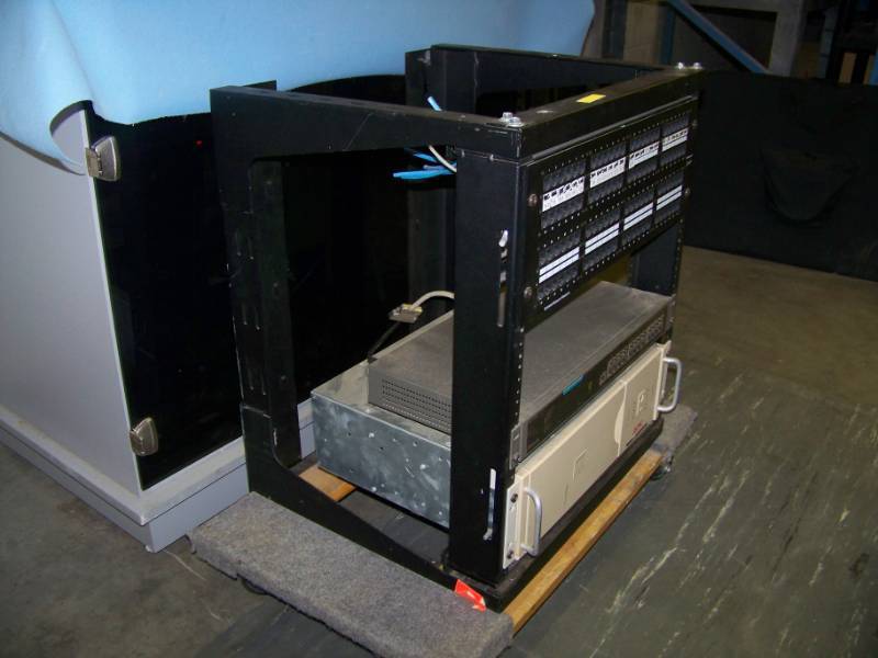 lot 56 image: Small  Compact, Audio  Video Equipment  Component Rack with Network Patch Panels, 24 Port Network Hub  and APC Smart UPS