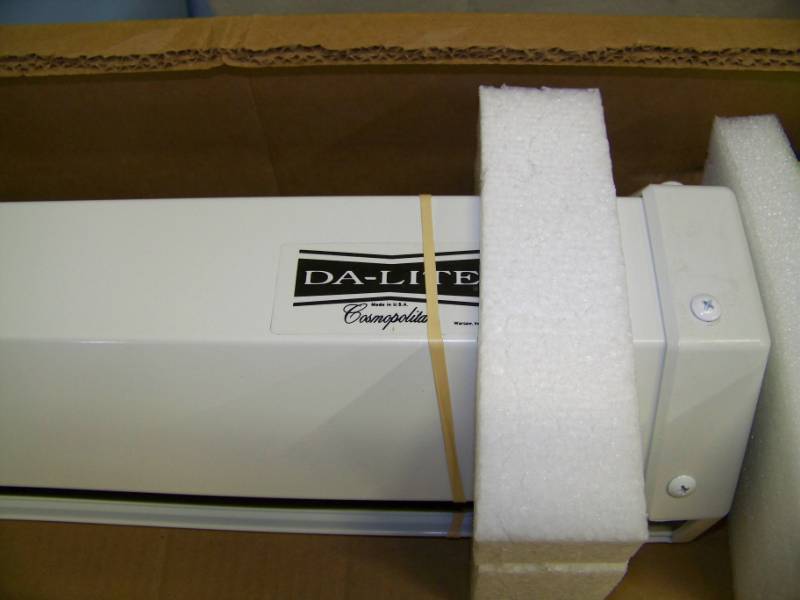 lot 27 image: Da-Lite, Cosmopolitan, Powered, Projection  Movie Screen with Control  Switch - NEW in Original Open Box