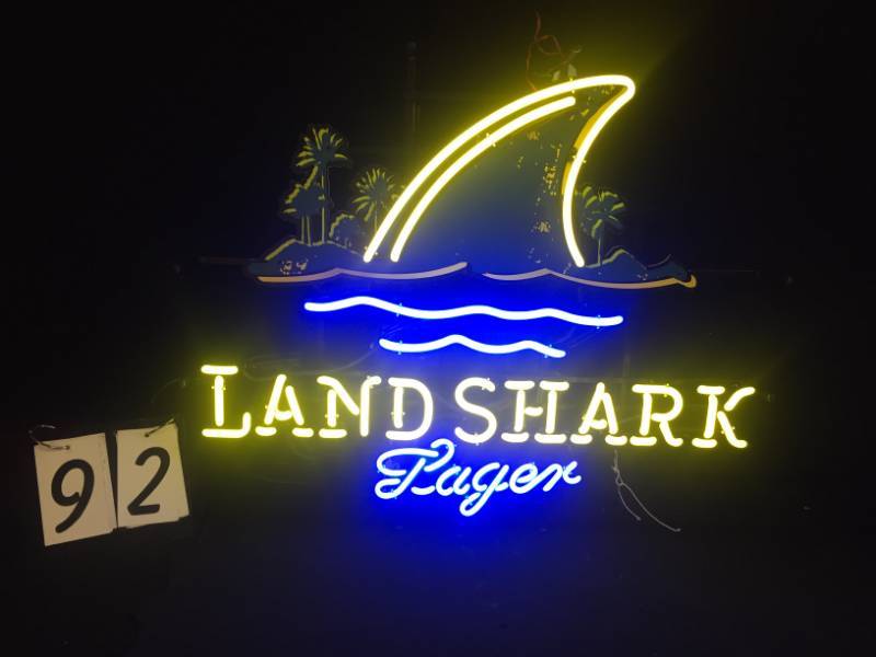 lot 92 image: Landshark logo neon sign