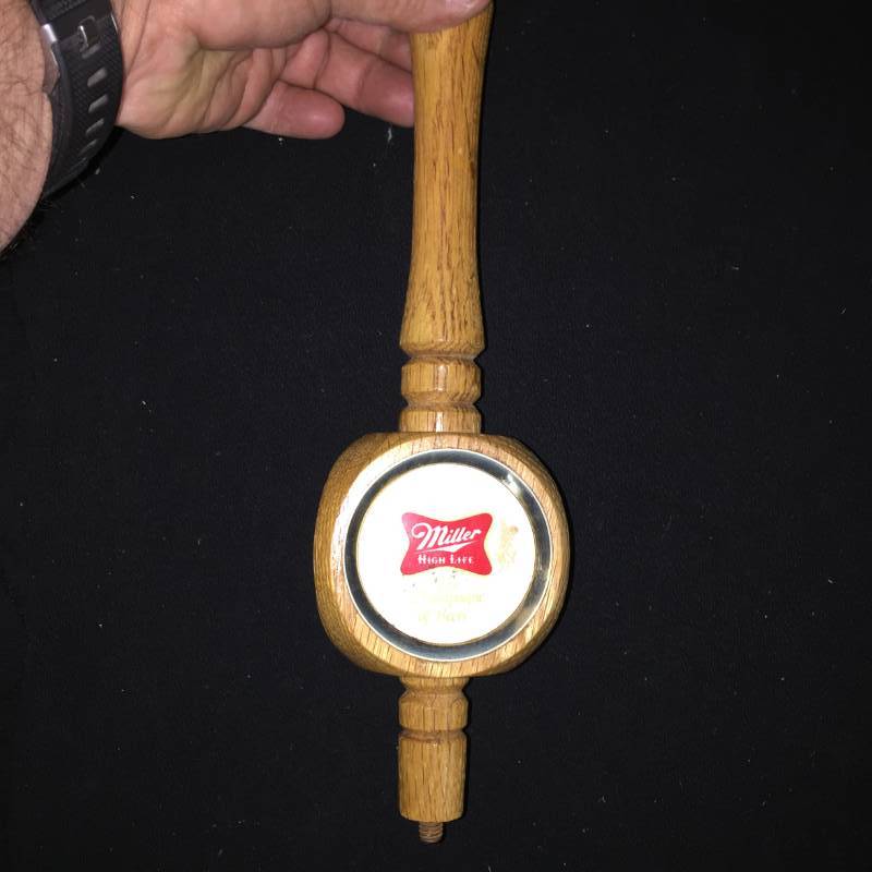lot 106 image: Miller High Life 3-sided tap handle