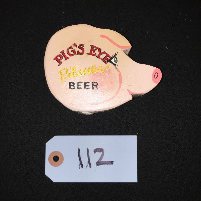 lot 112 image: Pigs Eye painted wood tap handle