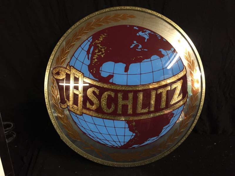 lot 116 image: Schlitz Beer convex mirrored sign
