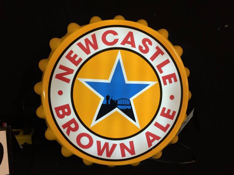 lot 130 image: Light up Newcastle Brown Ale bottle cap