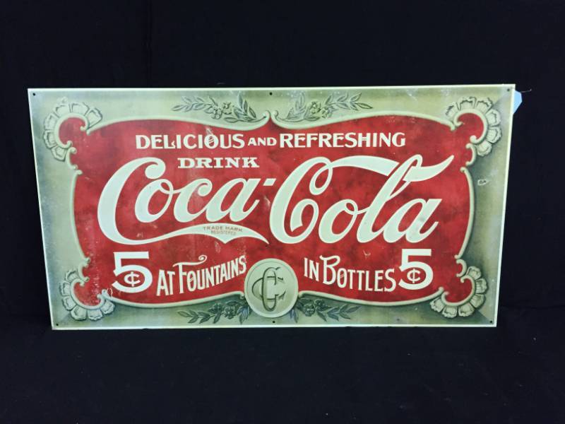 lot 202 image: Coca-Cola tin tacker