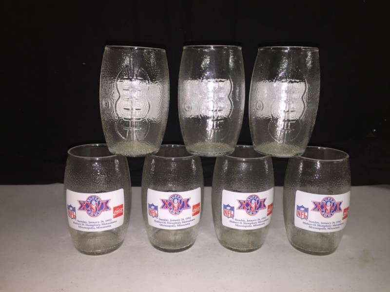 lot 231 image: Football shaped Coca-Cola NFL Superbowl glasses