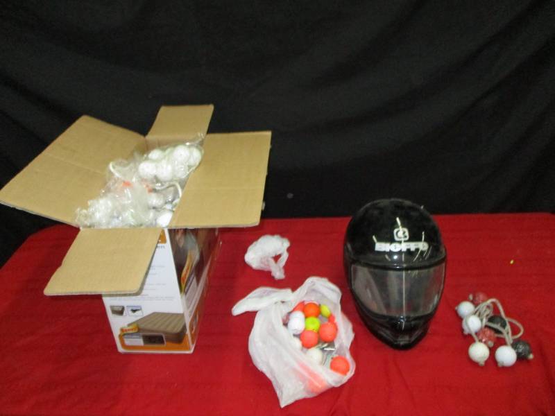 Multiple game balls for golf game  and motorcycle helmet