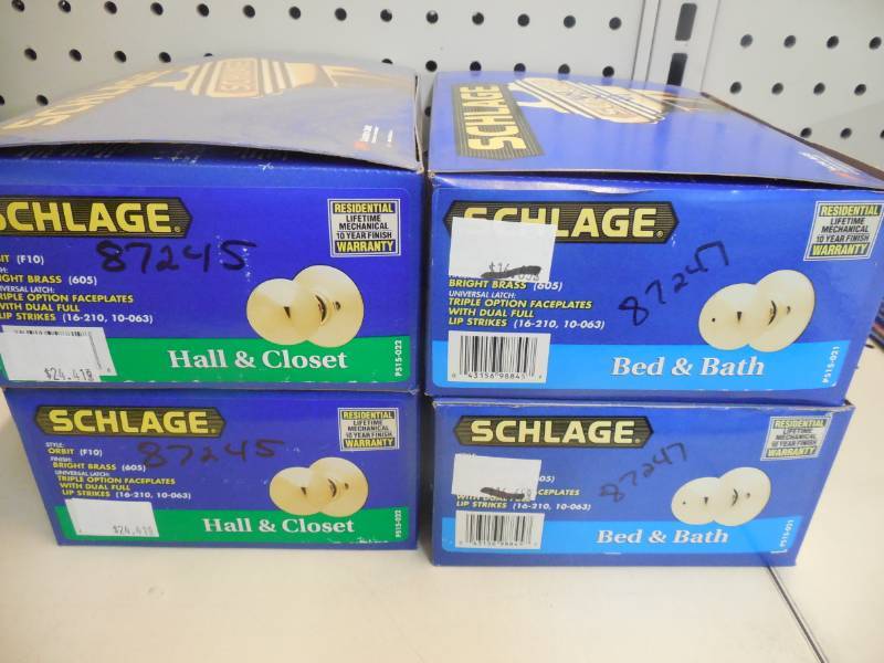 lot 325 image: SCHLAGE DOOR KNOBS , 2 BED  BATH & 2 HALLCLOSET-Bright Brass Orbit Style