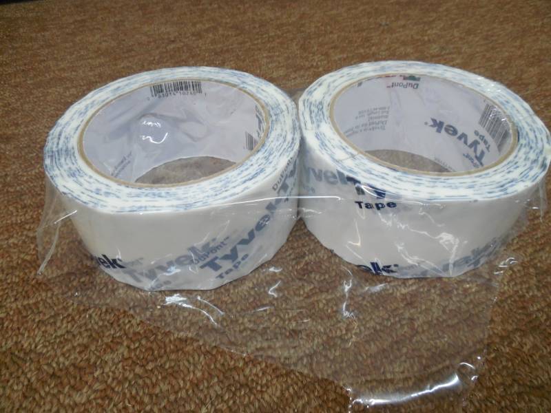 lot 397 image: (2) ROLLS OF TYVEK HOUSE WRAP TAPE 2 X 165