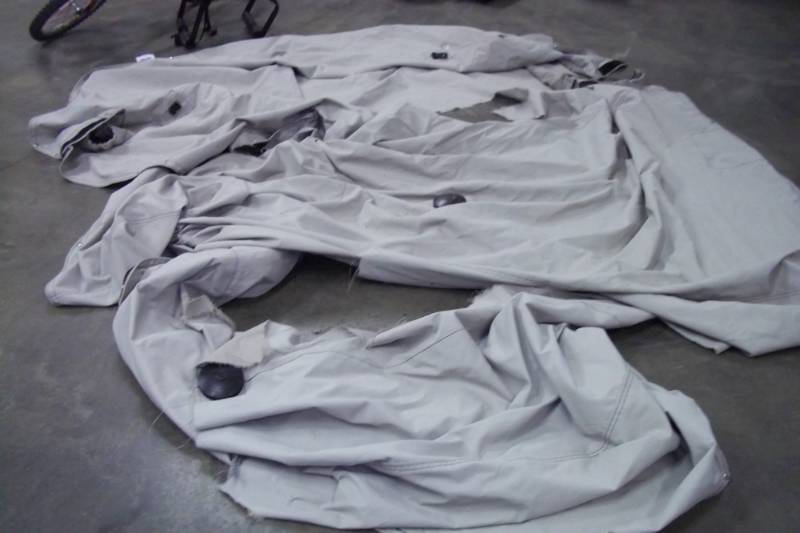 lot 12 image: Tarp Good for Woodpile