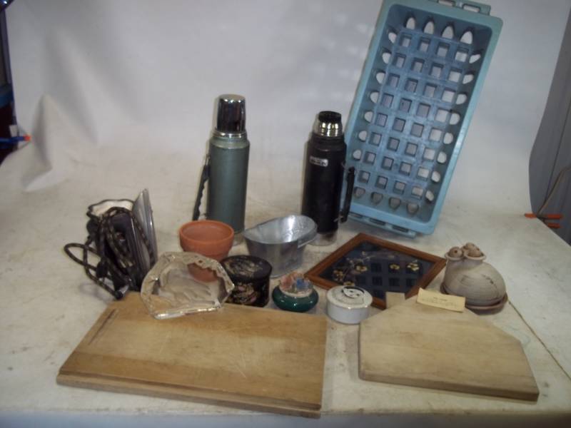 lot 46 image: Assorted Dcor, Cutting Boards, Thermos and vintage Iron