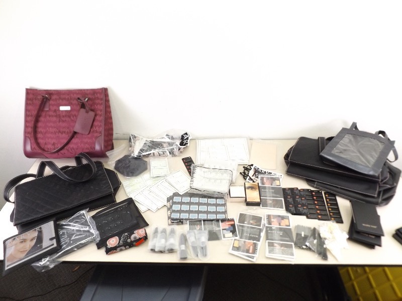 lot 34 image: Large Lot of Mary Kay Makeup, Samples, Bags, etc.