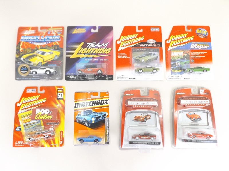 lot 44 image: 8 NEW Johnny Lightning, Match Box, American Muscle etc. Cars 