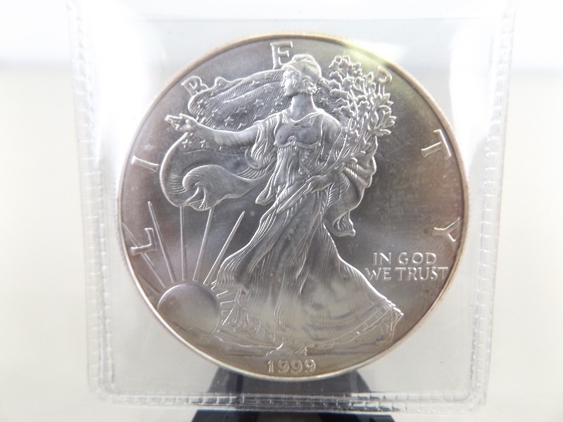 lot 56 image: MINT 1 Ounce 1999 American .999 Silver Eagle
