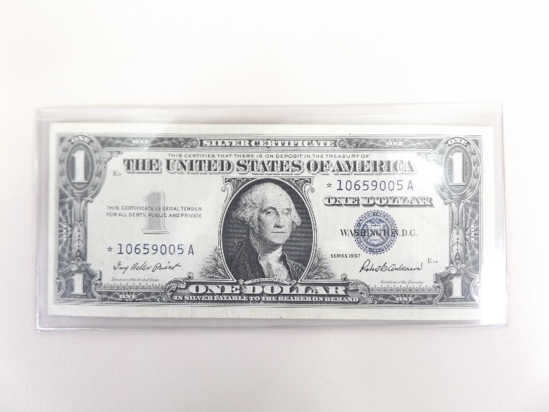 lot 66 image: 1957 MINT Uncirculated $1&nbspStar Note Silver Certificate