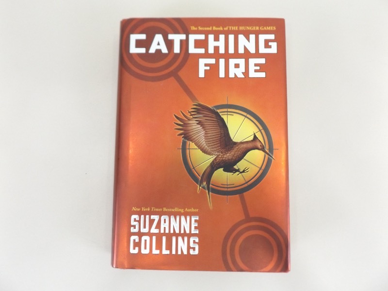 lot 90 image: First Edition Catching Fire Hard Cover Book