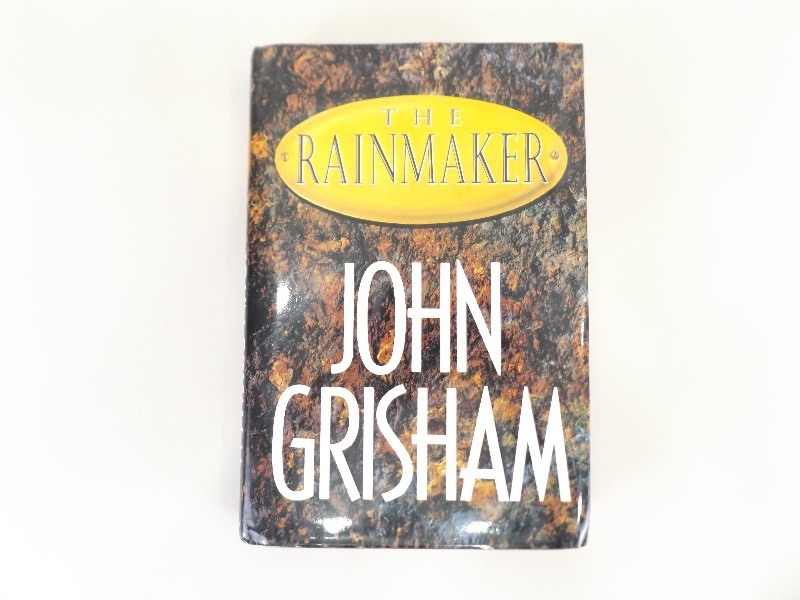lot 92 image: First Edition The Rainmaker Hard Cover Book