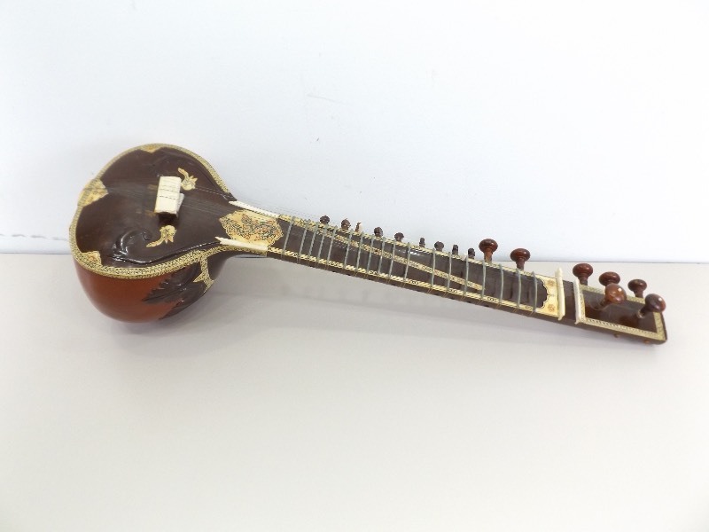 lot 119 image: Decorative Exotic Guitar Like Instrument