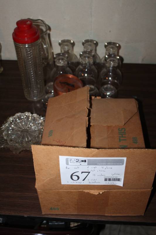lot 67 image: Bar Set Includes 6-Cups, 8-Glasses, 4-Shot Glasses, 10-Coasters, 1-Pitcher, 2-Ash Trays, 2-Alcohol Decanters, 1-Drink Seltzer
