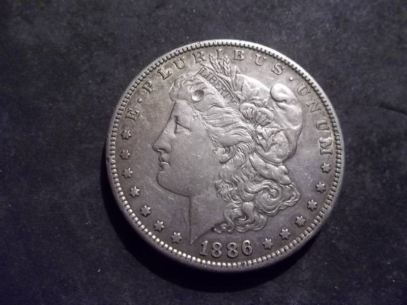 lot 7 image: 1886 S Morgan Silver Dollar