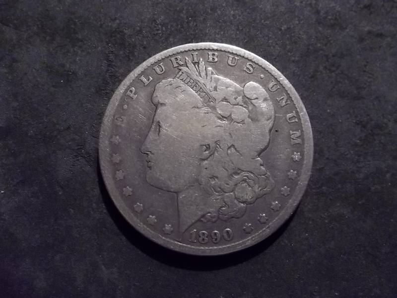 lot 11 image: 1890 O  Morgan Silver Dollar