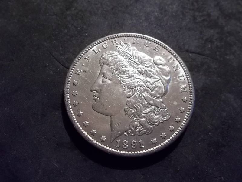 lot 13 image: 1891 S Morgan Silver Dollar