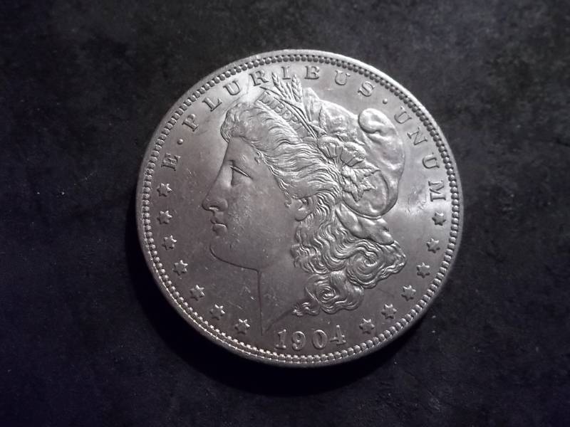 lot 17 image: 1904 O Morgan Silver Dollar