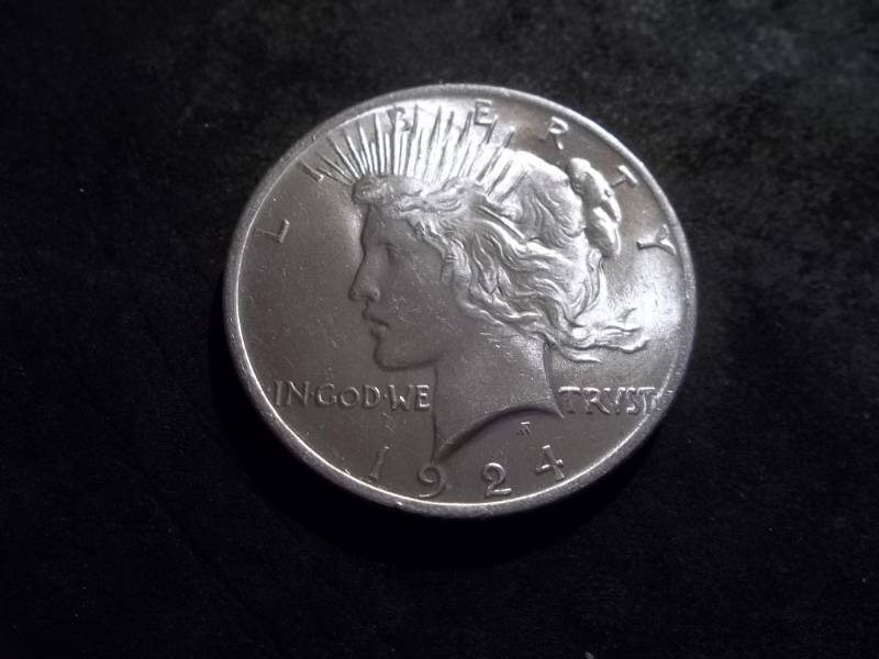 lot 27 image: 1924 Peace Silver Dollar