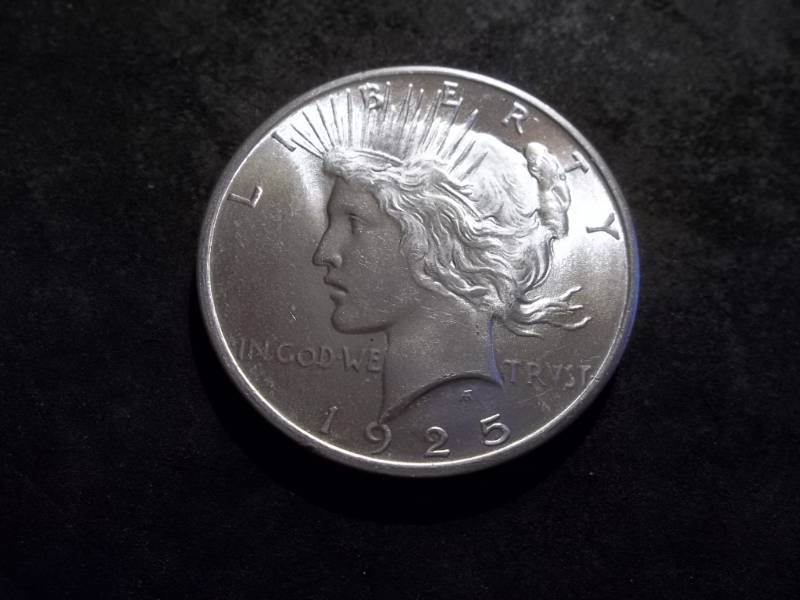 lot 29 image: 1925 Peace Silver Dollar
