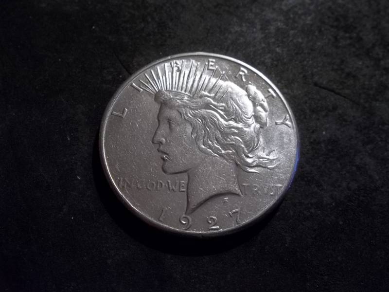 lot 36 image: 1927 S Peace Silver Dollar