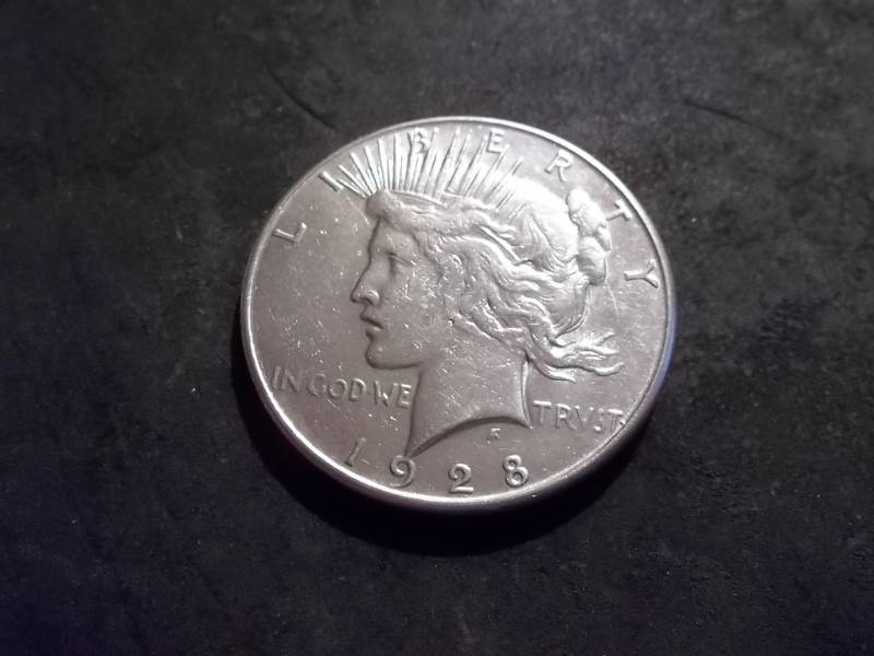 lot 38 image: 1928 S Silver Peace Dollar