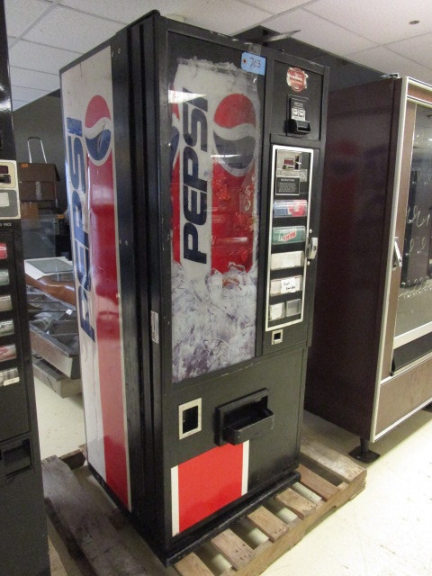 lot 703 image: PEPSI VENDING MACHINE