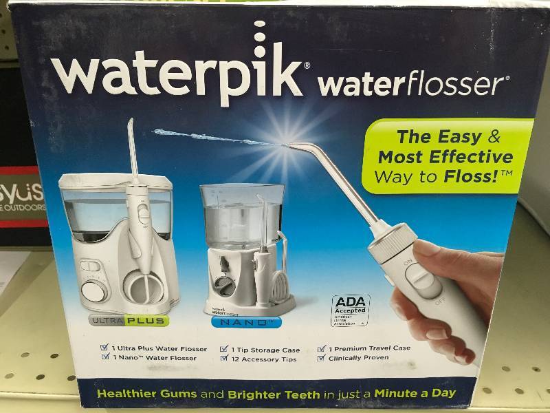 lot 2 image: Waterpik Water Flosser, Retail $79.99