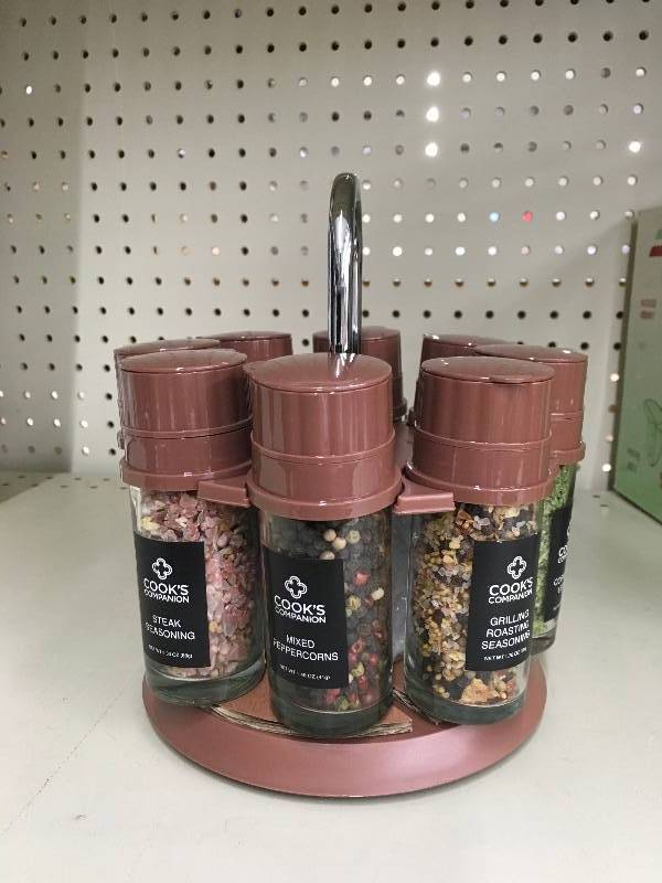 lot 79 image: Cooks Companion Set of 8 Glass Spice Grinders w Assorted Spices & Rotating Carousel, Retail $34.99