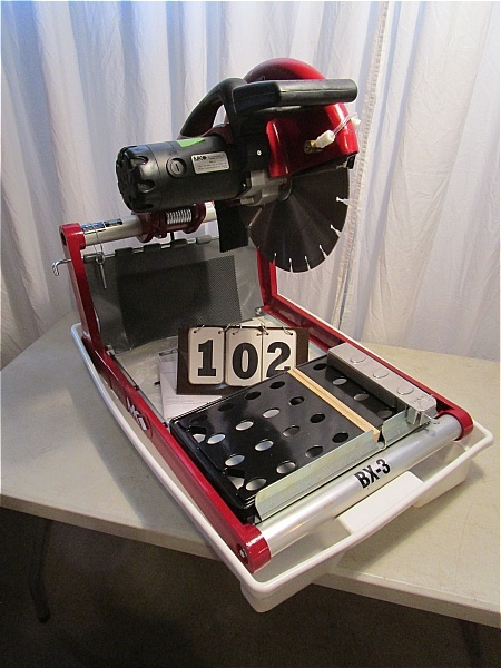lot 102 image: MK Diamond BX-3  Masonary Saw